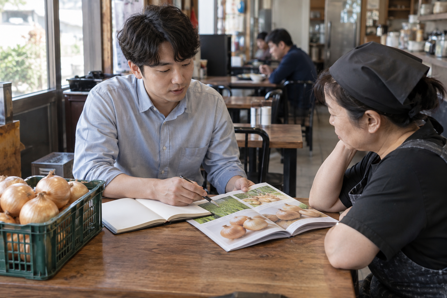 식자재 납품 상담을 준비하며 제품 규격 자료와 메모를 살펴보는 영업자